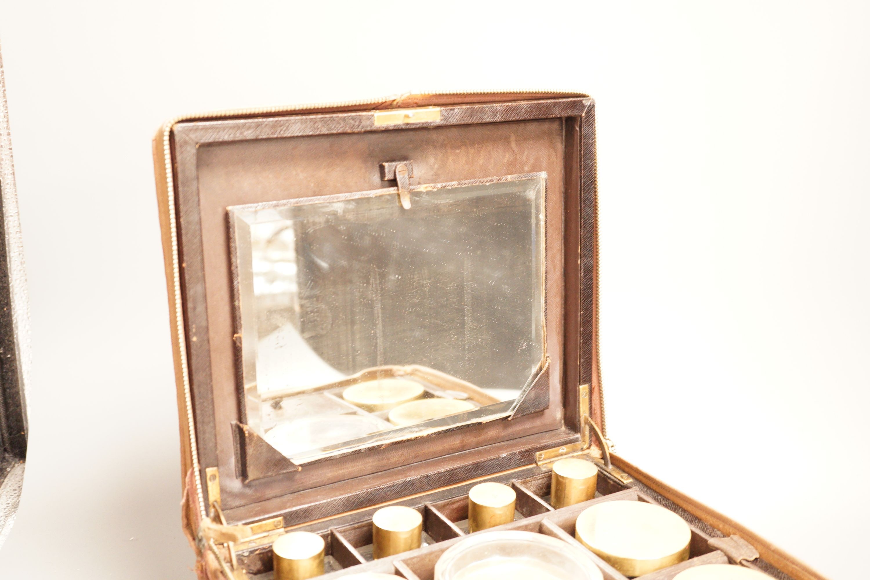An Asprey & Co. leather clad travelling vanity case